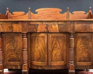 EXCEPTIONAL 19th C FLAME MAHOGANY SIDEBOARD QUERVILLE $3,500 OBO
Exceptional early 19th c. flame mahogany Classical carved sideboard.
Attributed to Anthony Quervelle of Philadelphia or Edward Priestly of Baltimore Maryland. Carved columns terminating in paw feet. Measures 75"x25"x56" tall to top of backsplash