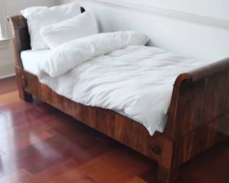 BEIDERMEIER WALNUT SLEIGH DAYBED $850
Stunning Walnut Beidermeier Style Day Bed. Purchased in Austria. Provenance: A Charleston SC Private Estate Headboard/footboard: 36" w x 34" h x 5" thick, Rails: 72" long