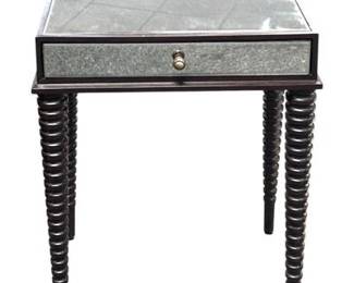 AMBELLA HOME COLLECTION MIRRORED ACCENT TABLE $425
This Ambella Home Collection mirrored table combines functionality with timeless design. The table features a reflective mirrored top and drawer front, accented with a single decorative knob. The spiraled legs showcase craftsmanship and attention to detail, making it a versatile piece for various settings. This table is an excellent addition for collectors or those who appreciate sophisticated home furnishings. Measures 23.5"x18"x12"