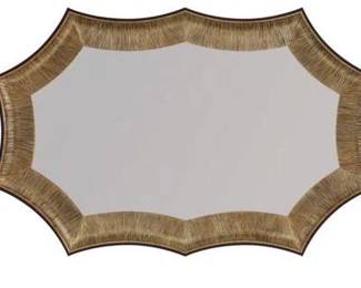 AMBELLA HOME HELIOS LARGE MIRROR $550
This elongated star shaped mirror features a thick wood frame carved with thick textured ribbing. The walnut colored frame is further accented with gold highlighting. Beveled clear glass mirror completes this piece. Mirror can hang vertically or horizontally on metal cleat. Measures 54"x36"x2.5".