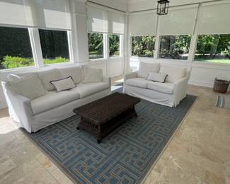 Frontgate Sofa & Loveseat Outdoor Furniture (kept inside) Wicker Rattan Outdoor Coffee Table and rug (sold seperately)