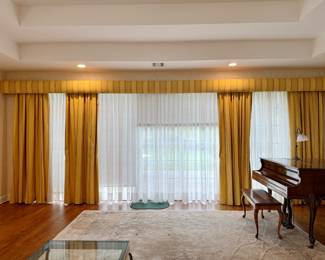Two windows of custom window treatments