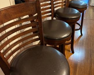 Set of four swivel barstools