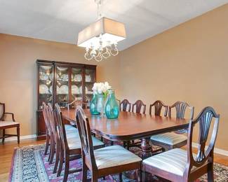Antique 1930s Mahogany Dining Set for 12 - Table, 10 side chairs, 2 end chairs, china hutch, dresser, and buffet. Bassett
