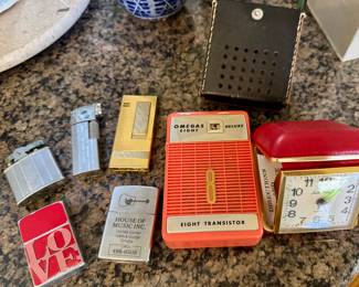 Vintage butane lighters and transistor radio