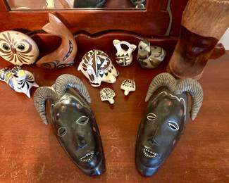 Vintage masks, pottery and wooden fish
