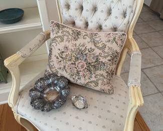 One of a pair of Tufted arm chairs, sterling