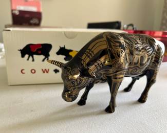Cow parade - black and gold tattooed bull