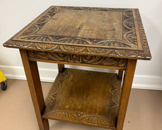 Carved wood side table.....