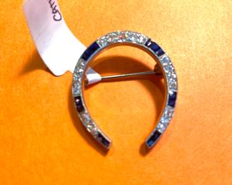 14kt sapphire and diamond horseshoe brooch (2.5" approx.)