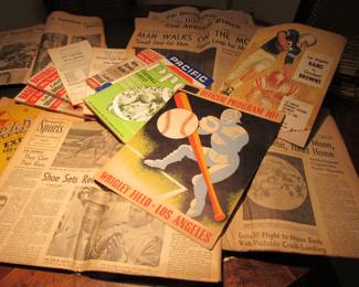 Tons of sports-related magazines, programs, tickets, and newspapers