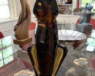 This stylized cat statue certainly has a certain flair, don't you think?