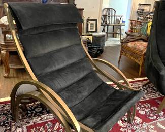This chair certainly has a different style, with the metal frame and accents.
