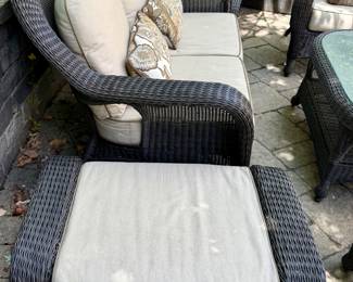 6 Pc Outdoor Wicker Seating Group with a Loveseat, 2 Matching Chairs and Ottomans and Coffee Table with Cushions by Sunbrella.