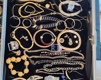 Tons of costume jewelry ... Sorry no gold