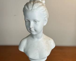 After Jean-Antoine Houdon (1741-1828) - Female Bust | Bust of Louise Brogniart in bisque porcelain, after the original by Jean-Antoine Houdon (1741-1828.) - h. 12 x dia. 4.25 in