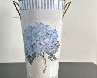 Painted Tin Vase with Floral Design | Vintage tin vase or utensil holder with painted hydrangea floral design.
Dimensions: h. 11 x w. 7.5 in