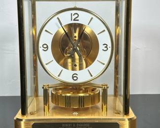 Jaeger-LeCoulture Brass Atmos Clock | Vintage Jaeger-LeCoulture (Swiss) brass ATMOS clock with thirteen jewels. Engraved with personal accomplishments. - h. 9 x w. 6 x l. 7.5 in