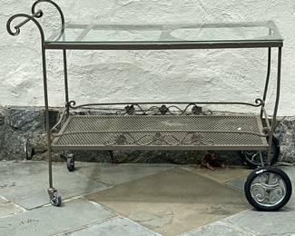 Wrought Iron Bar Cart | Wrought iron outdoor/patio bar cart on wheels, with a glass top insert, various openings on the top for serving pieces (ice bucket, etc.) and a floral design along the lower shelf. Similar to Woodard Furniture designs. - h. 34 x w. 20 x l. 45 in
