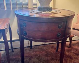 Round mahogany leather top table. Excellent condition.