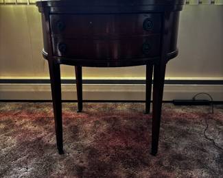 round, mahogany drum table. Perfect condition