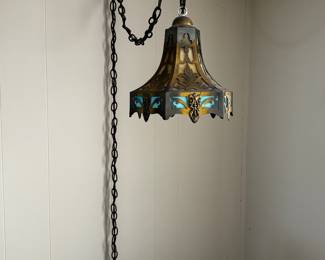 Antique, opalescent glass & cutwork brass Ceiling pendant light. Slag Glass. Circa 1920. the glass is blue & caramel colored. Wiring is original.