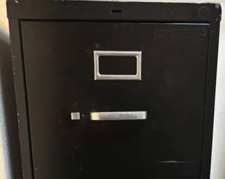 4-drawer metal filing cabinet.