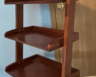 Brown open book shelf with 5- shelves. 55.5H x 15D x 24 W