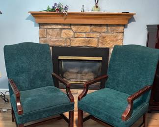 Nice high-back upholstered green chairs. Solid wood.