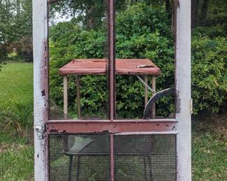Large screen door from mercantile store 