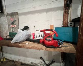 Leaf blower and signs