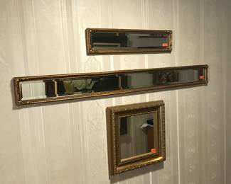 Lovely gold framed mirrors!