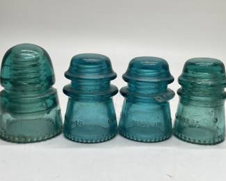 Four Vintage Glass Insulators