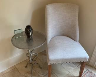 Metal table, linen chair