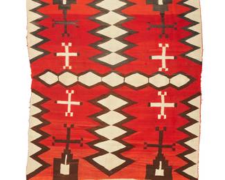 197
A Navajo transitional regional textile
Late 19th century, Diné
Woven in red, cream, and black wool with a central column of stacked diamonds and two columns of floating crosses, with banded ends
81" H x 61.5" W
Estimate: $1,500 - $2,000
