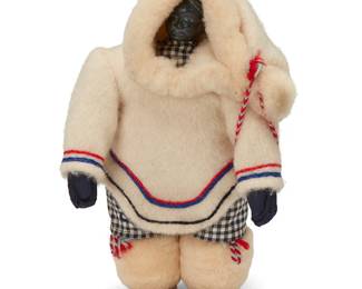 2
An Inuit doll
Early 20th century; Nunavik, Northern Quebec, Canada
A standing figure with carved green stone face, padded body, and with fabric clothing including felted wool parka and hood, hide boots, shearling wool trim accents and yarn embroidery
12" H x 7.25" W x 5" D approximately
Estimate: $200 - $400