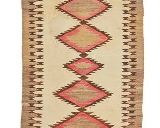 201
A Navajo regional rug
Mid-20th century, Diné
Woven in variegated brown/grey, red, brown, and cream wool with a central column of stacked serrated diamonds, and a complex serrated border to two sides
57.5" H x 35" W
Estimate: $300 - $500