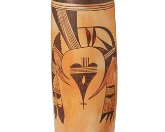 242
A large Hopi Pueblo polychrome pottery vessel
Early/mid-20th century, Hopi-Tewa
Unsigned; pencil marks to base: H + W
The tall cylinder jar with avian motif to each side
15.25" H x 5.5" Dia. approximately
Estimate: $600 - $900