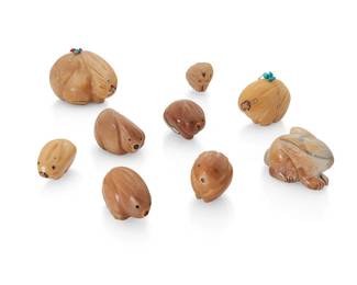 320
A group of Zuni carved tagua nut and stone fetish figures
Mid/late 20th century
Six with labels for artist
Comprising seven abstract rabbit figures and one porcupine figure, all carved in tagua nut by Melissa Quam (b. 1969, Zuni Pueblo) as well as a carved stone rabbit figure by Georgette Quam (b. 20th century, Zuni Pueblo), some carvings with inlaid turquoise eyes and heartlines, and two with mounted offerings
9 pieces
Largest: 1.75" H x 2.75" W x 2" D; Smallest: 1" H x 1.5" W x 1" D
Estimate: $200 - $400