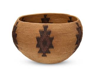 188
A polychrome Washoe basketry bowl
Early 20th century; Northern California/Nevada
A large coiled globular bowl with six floating stepped medallions
6" H x 10" Dia.
Estimate: $400 - $600