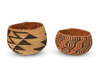 41
Two small polychrome Hupa/Yurok/Karuk baskets
Early 20th century; Northern California
Comprising a globular twined bowl with imbricated diagonal zigzag and triangle motifs, and a diminutive globular bowl with overall imbricated zigzag diagonal ticking
2 pieces
Larger: 3.5" H x 4.5" Dia.; Smaller: 2.5" H x 4" Dia.
Estimate: $200 - $400