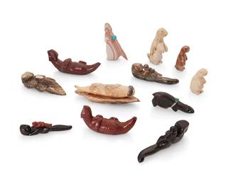 264
A group of Zuni & Navajo carved stone fetish figures
Mid/late 20th century
Some variously labelled for or signed by the artist; one marked: MC/Zuni; one with bag marked: Ohmsattie [sic]
Comprising seven otters, a bear, and four squirrels or ground squirrels, in various stones including jet, from various makers such as J. Red Elk, David Yazzie (Navajo/Diné), Patricia Wayne, Melissa Quam, and Larry Antez, some with turquoise inlaid features, two mounted with offerings
12 pieces
Largest: 1.375" H x 3.5" W x 1" D; Smallest: 1.5" H x 0.625" W x 0.875" D
Estimate: $200 - $400