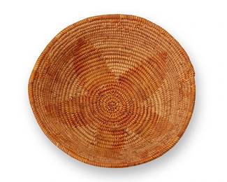 5
A small California Mission basket
Early 20th century; Southern California
The small bowl with central star flower motif and flared rim
2.25" H x 7.125" Dia.
Estimate: $200 - $400