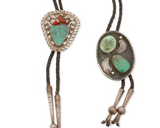 330
Two Southwest sterling silver and turquoise bolo ties
Mid/late 20th century
Unmarked
Comprising a sterling silver oval bolo with two shadowbox-style set turquoise cabochons and silver leaf overlay motifs, with silver squash blossom tips, and a triangular sterling silver bolo with set branch coral and chrysocolla, with stamped silver overlay accents and a twined overlay edging, and with silver ball tips, each mounted to a braided leather cord
2 pieces
Bolo slides: 2.75" H & 2.5" H; cords including drops: 38" L & 36" L
130.8 grams gross
Estimate: $300 - $500