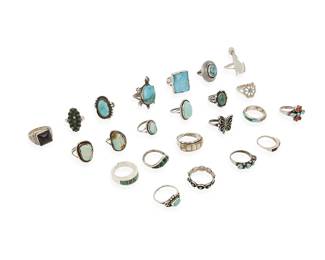 378
A group of Southwest silver and stone set rings
Mid/late 20th century
Eight variously marked for maker including L.L.Lee [for Larson L Lee, Navajo/Diné] / BP / M / LW / B / RS; nine marked for sterling
Featuring various stones including turquoise, coral, mother of pearl, onyx, and malachite, in various styles including bezel-set, cluster-set, mosaic inlay, and silver overlay, and figural motifs including a howling wolf, a butterfly, and a turtle
23 pieces
Ring sizes: 9.75 to 5
114.2 grams gross
Estimate: $200 - $400