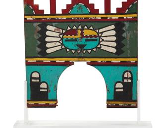 110
A Hopi polychrome carved wood tableta
Early 20th century
The painted plywood headpiece depicting Zuni katsina iconography to each side, mounted in a custom acrylic stand
Tableta: 15" H x 14.125" W x 0.25" D; Stand: 7.5" H x 17.375" W x 2.75" D
Estimate: $1,000 - $1,500