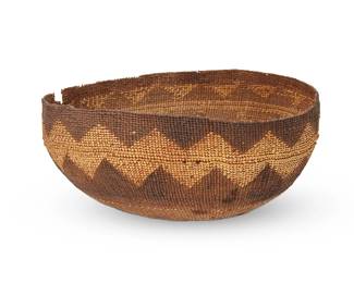 45
A Hupa/Yurok/Karuk mush bowl
Late 19th/early 20th century; Northern California
A large twined basket with pale zigzag overlay banding
4.5" H x 10" W x 9" D
Estimate: $200 - $400