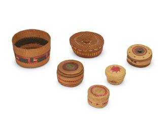 369
A group of Northwest Coast baskets
Early/mid-20th century; Pacific Northwest Coast
Six works comprising a polychrome tall bowl with imbricated red step motif, as well as four diminutive polychrome lidded baskets in various sizes, designs, and colors, as well as a larger lidded basket in brown with contrast imbricated banding
11 pieces (including lids)
Bowl: 3.375" H x 5" Dia.; Largest lidded: 2" H x 5" Dia.; Smallest: 1.5" H x 2.5" Dia.
Estimate: $500 - $700