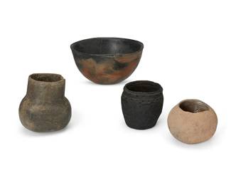 374
A group of Southwest pottery vessels
Prehistoric or later
Comprising a cooking bowl, a fluted vessel, a jar with corrugated rim, and a rounded vessel
4 pieces
Bowl: 4" H x 7.5" Dia.; Smallest: 3.5" H x 4.25" Dia.
Estimate: $300 - $500