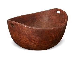 73
An Iroquois carved burlwood bowl
19th century or earlier
With opposed rectangular cutouts for handles
7.625" H x 15" W x 13" D
Estimate: $2,000 - $3,000